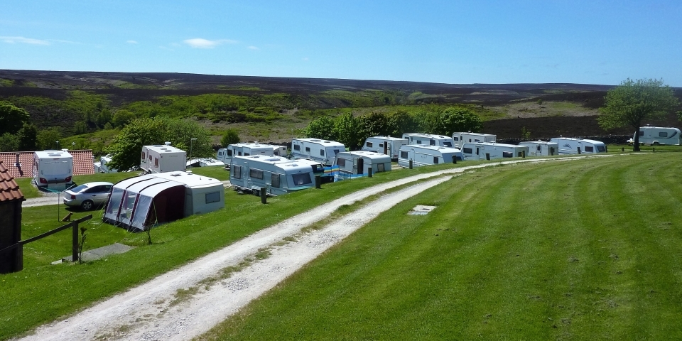 Sunshine on some tourers at Grouse Hill